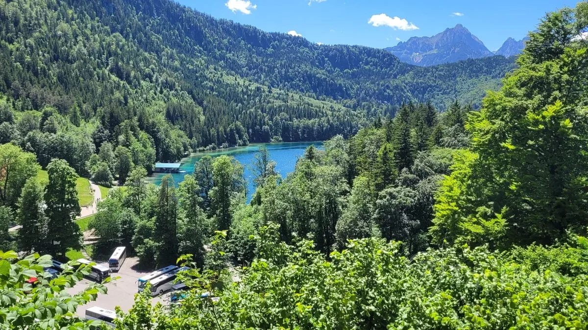 Panoramic view of Alpsee Lake and Bavarian Alps near Neuschwanstein Castle during a private Germany tour