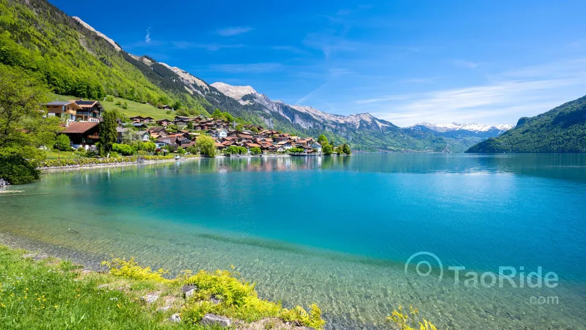 Lake Thun and Lake Brienz near Interlaken in the Swiss Alps with crystal-clear turquoise water and mountain scenery.