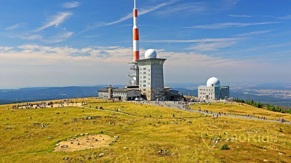 Brocken summit in Harz National Park with mountain observation station and communications tower