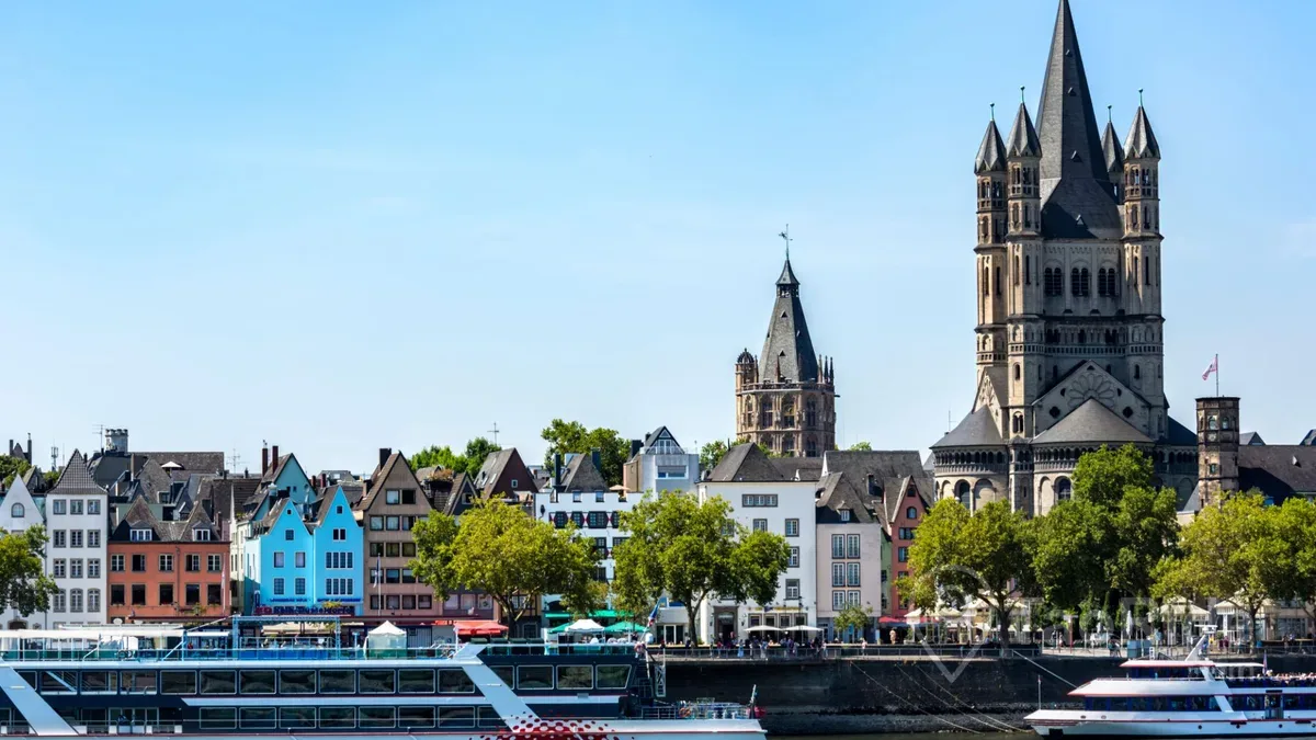 Cologne city skyline and Rhine River with historic waterfront