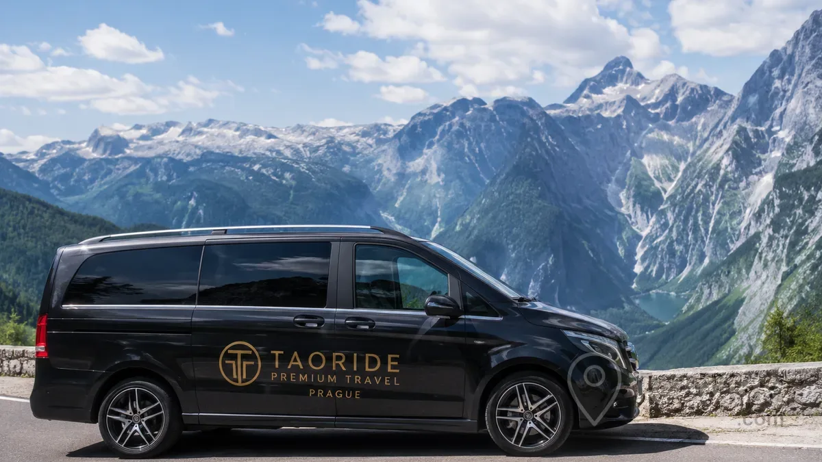 Luxury Mercedes private transfer in the Bavarian Alps near Eagle's Nest (Kehlsteinhaus), Germany, surrounded by spectacular mountain scenery, panoramic Alpine roads, and breathtaking views over Berchtesgaden National Park.