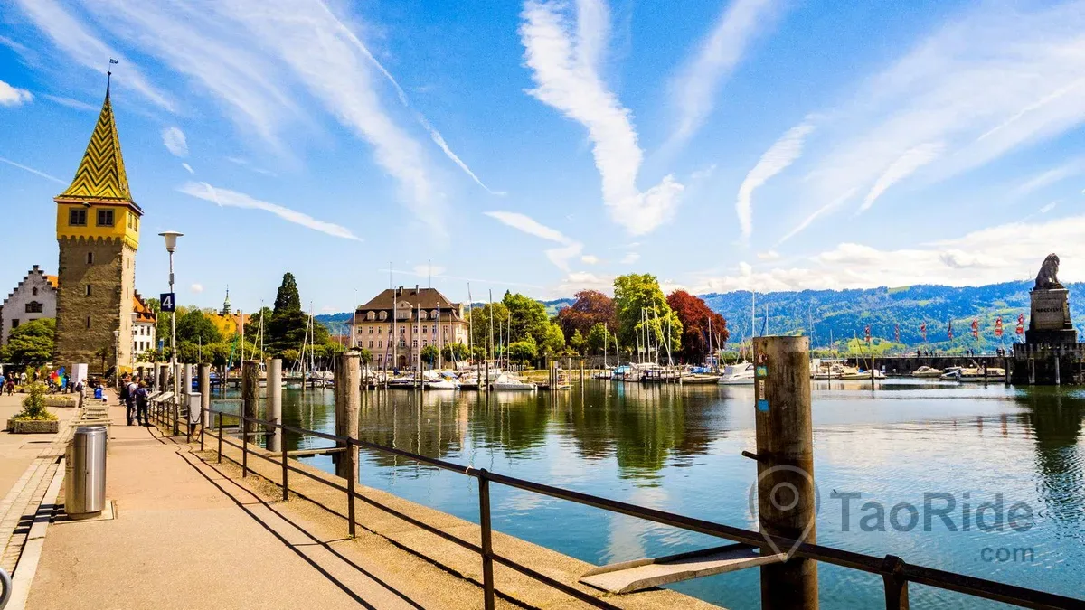 Lake Constance promenade in Lindau with the Alps in the background