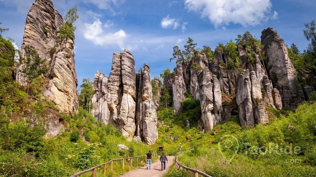 Real photographs of Adršpach Rock City in the Czech Republic featuring towering sandstone formations, emerald lakes, scenic hiking trails, narrow rock passages, and breathtaking natural landscapes.