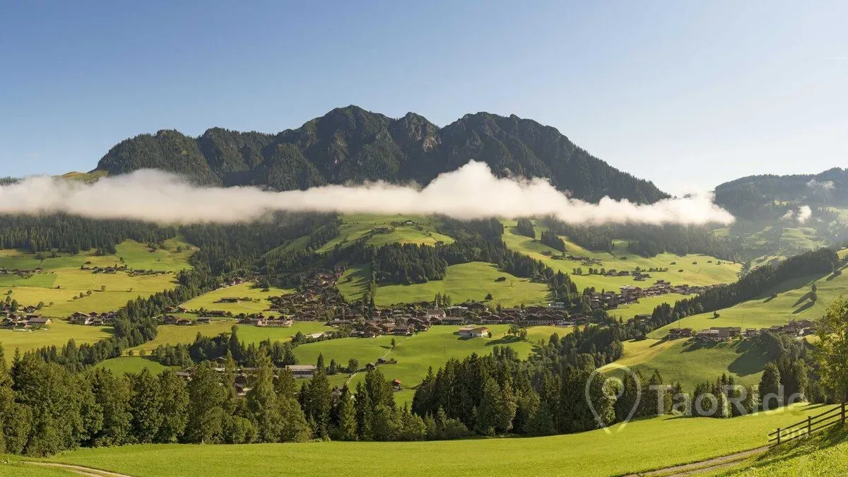 Alpbach village surrounded by colorful autumn forests in Austria