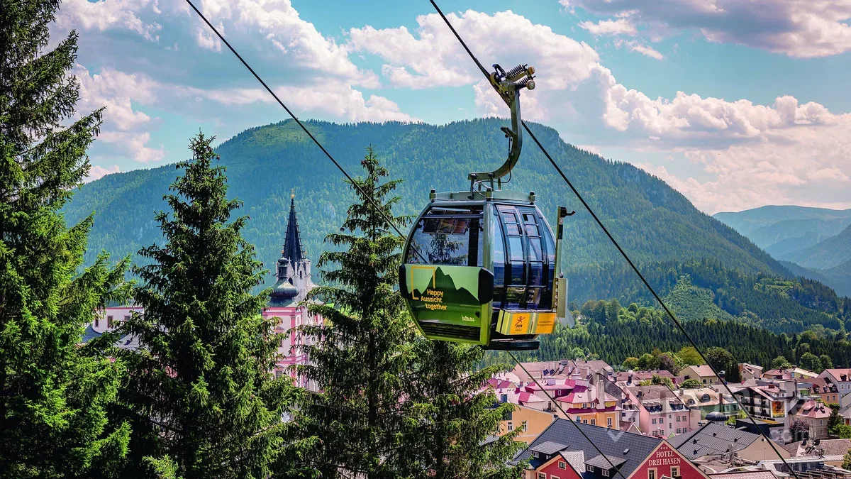 Bürgeralpe Mountain overlooking Mariazell with cable car and panoramic Alpine views
