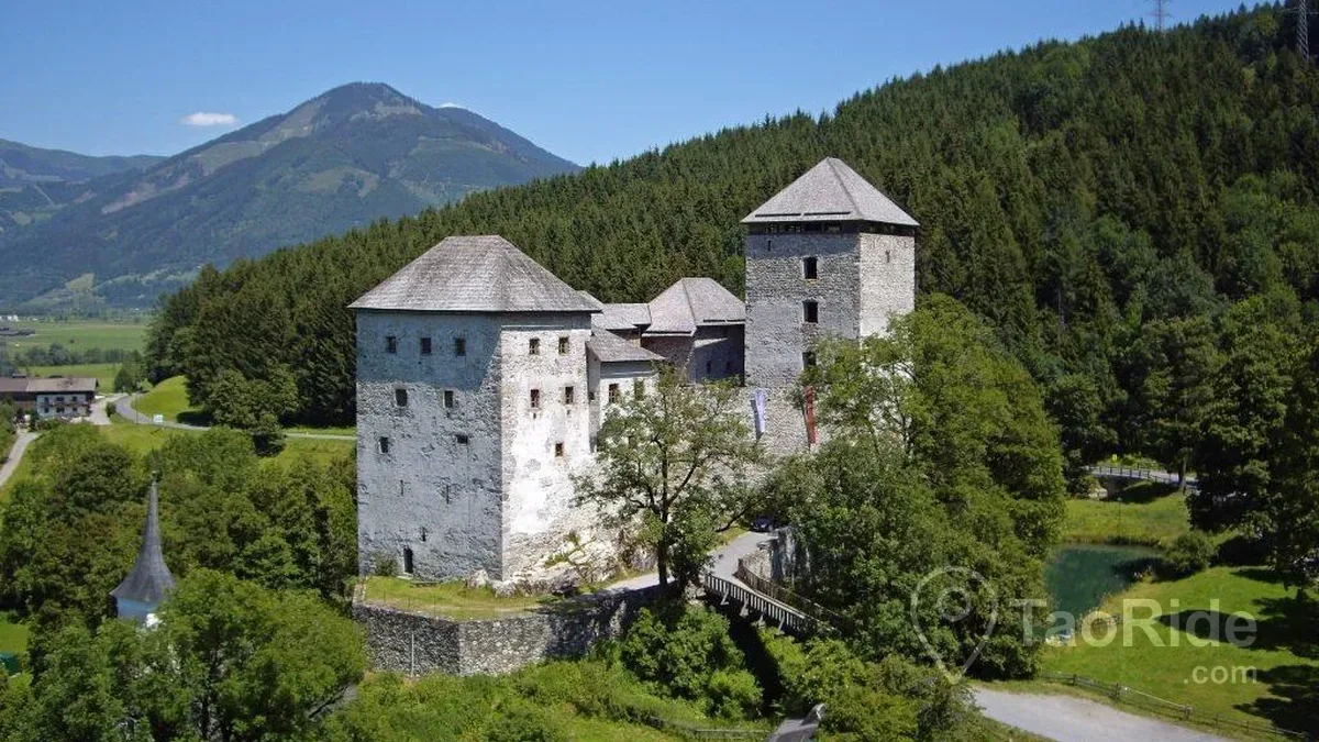 Historic Kaprun Castle with mountain scenery in Austria