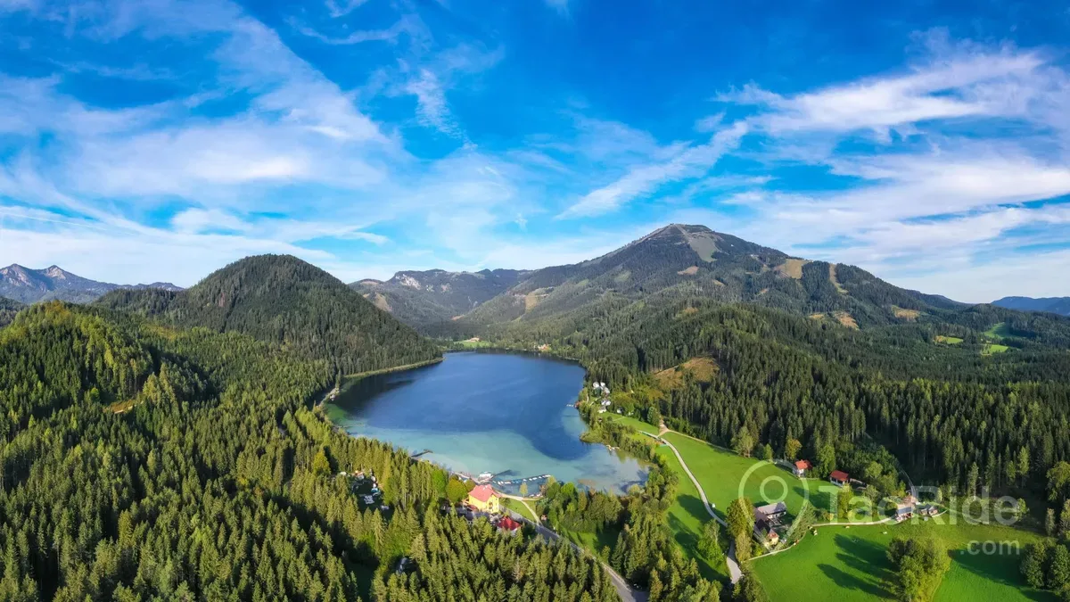Crystal-clear Erlaufsee Lake near Mariazell surrounded by forests and Austrian Alps