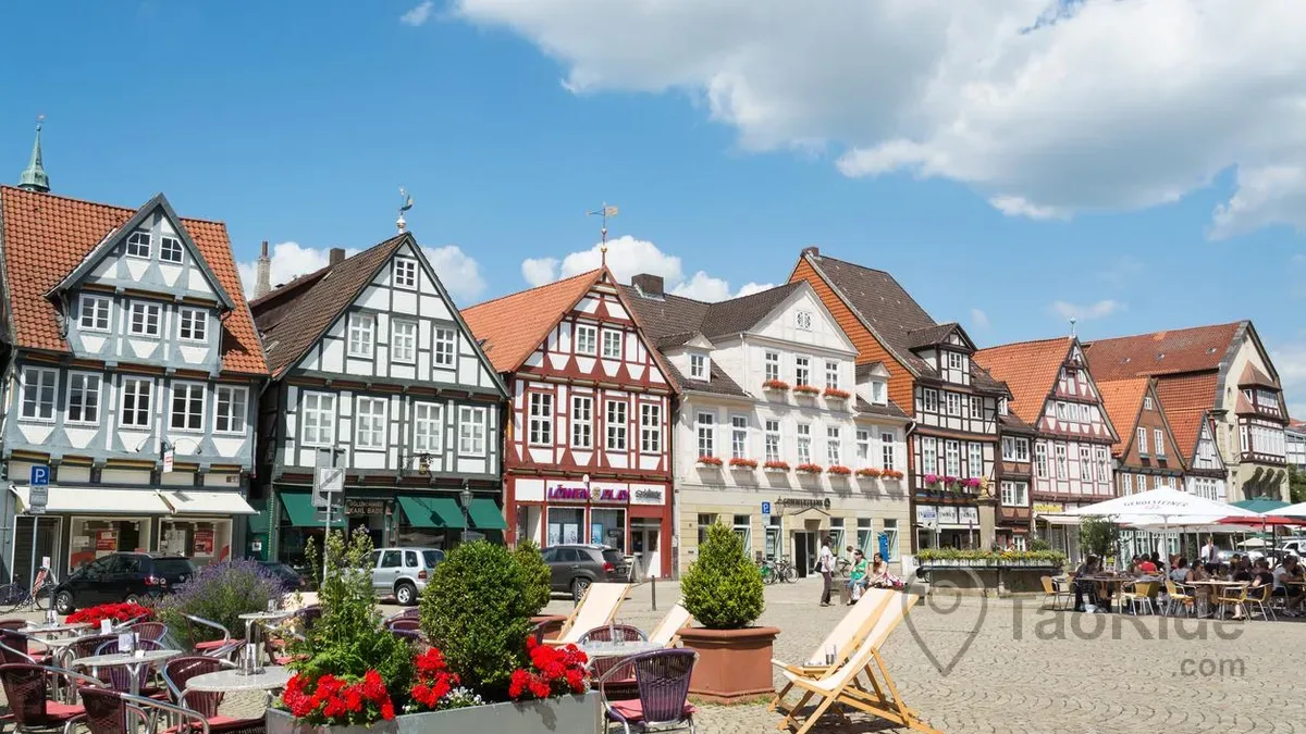 Colorful Fachwerk buildings and cafés in Celle Market Square, Germany